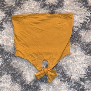 Yellow tube crop top with bow in front
